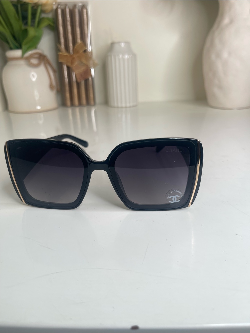 CHANEL Black Sunglasses with Gold Accent